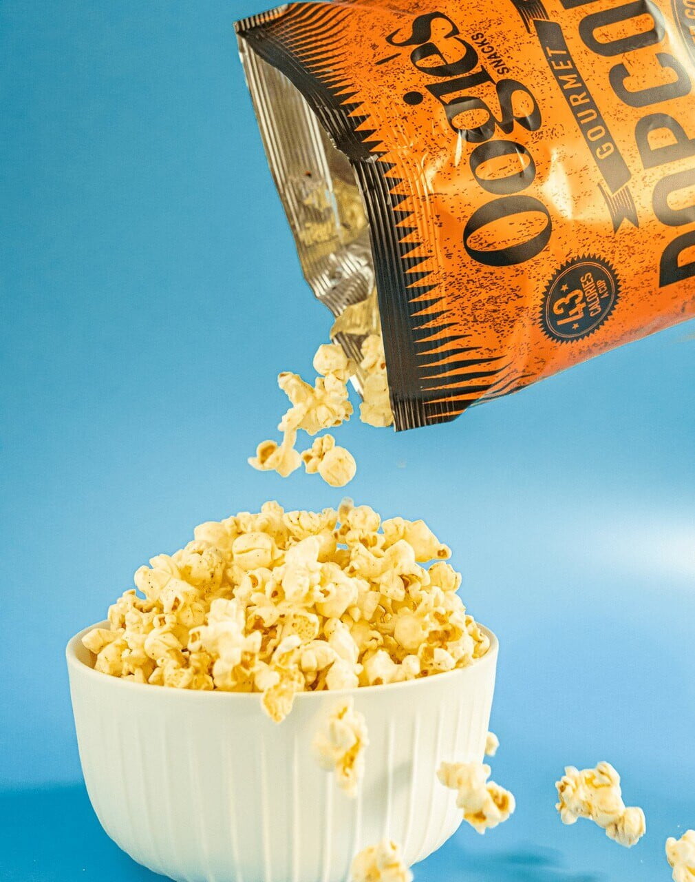 Hickory smoked gouda popcorn poured in bowl